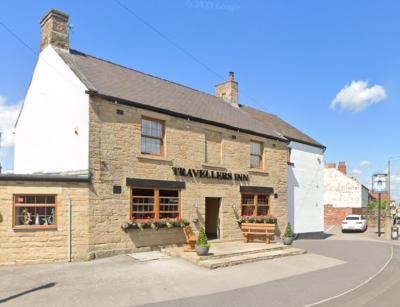 Travellers Inn - image 1